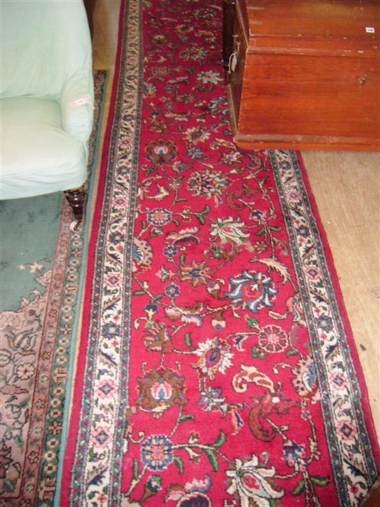 Red ground Persian runner
